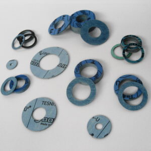 Compressed Fibre Washers blue washers on a white background